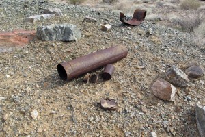 Stovepipe and cans.  Someone must have really wanted sardines.